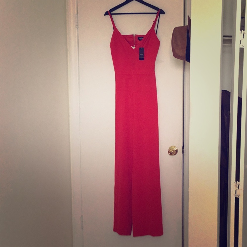 Jump suit orange Bebe